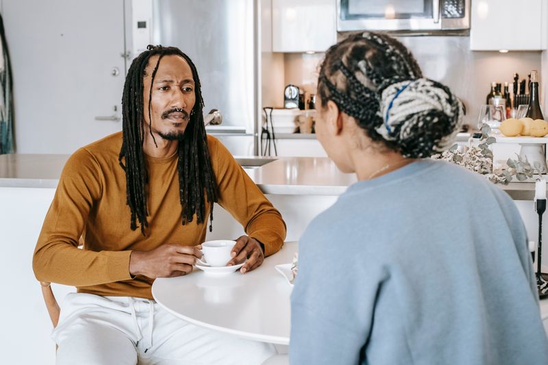 A couple talking at a table