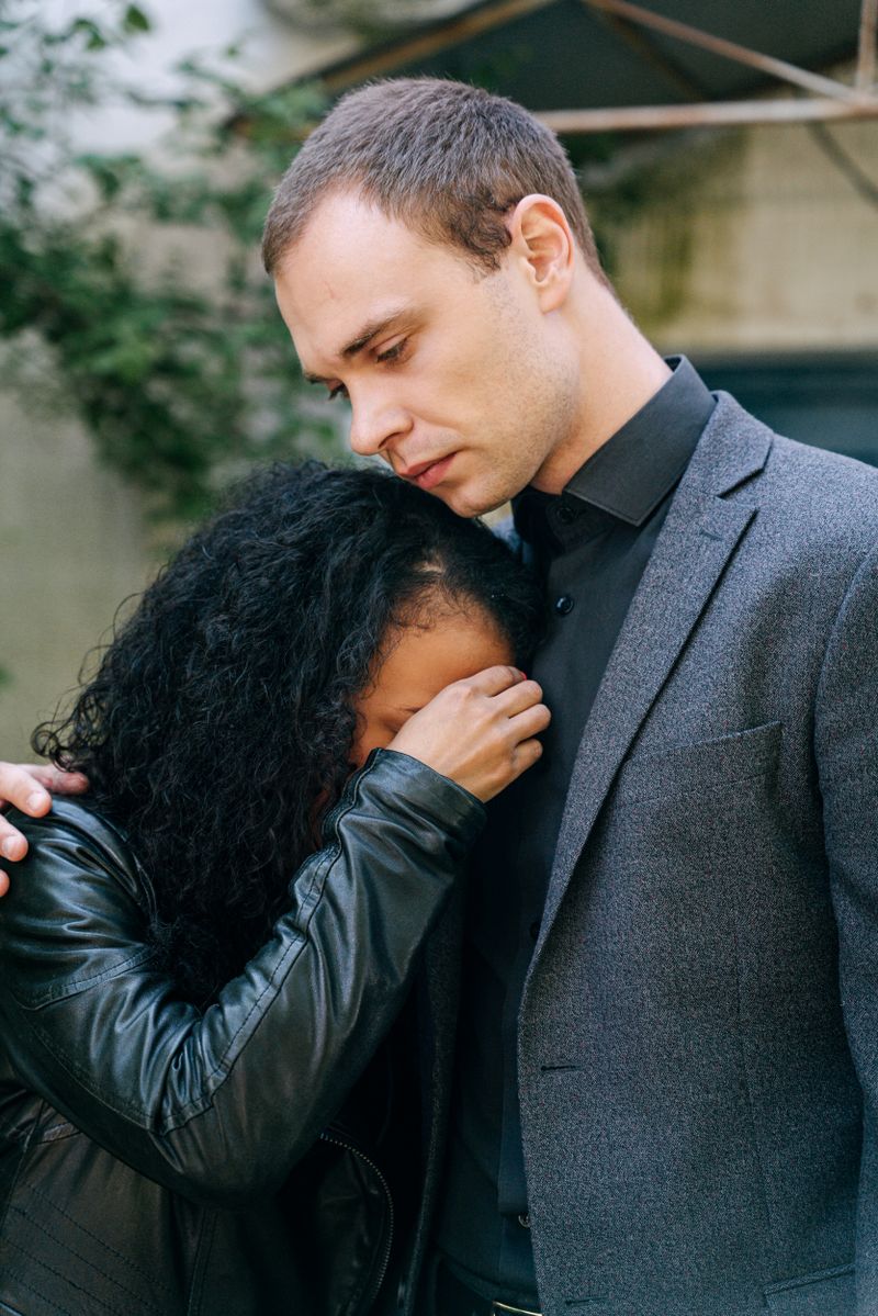 Two people embracing in comfort
